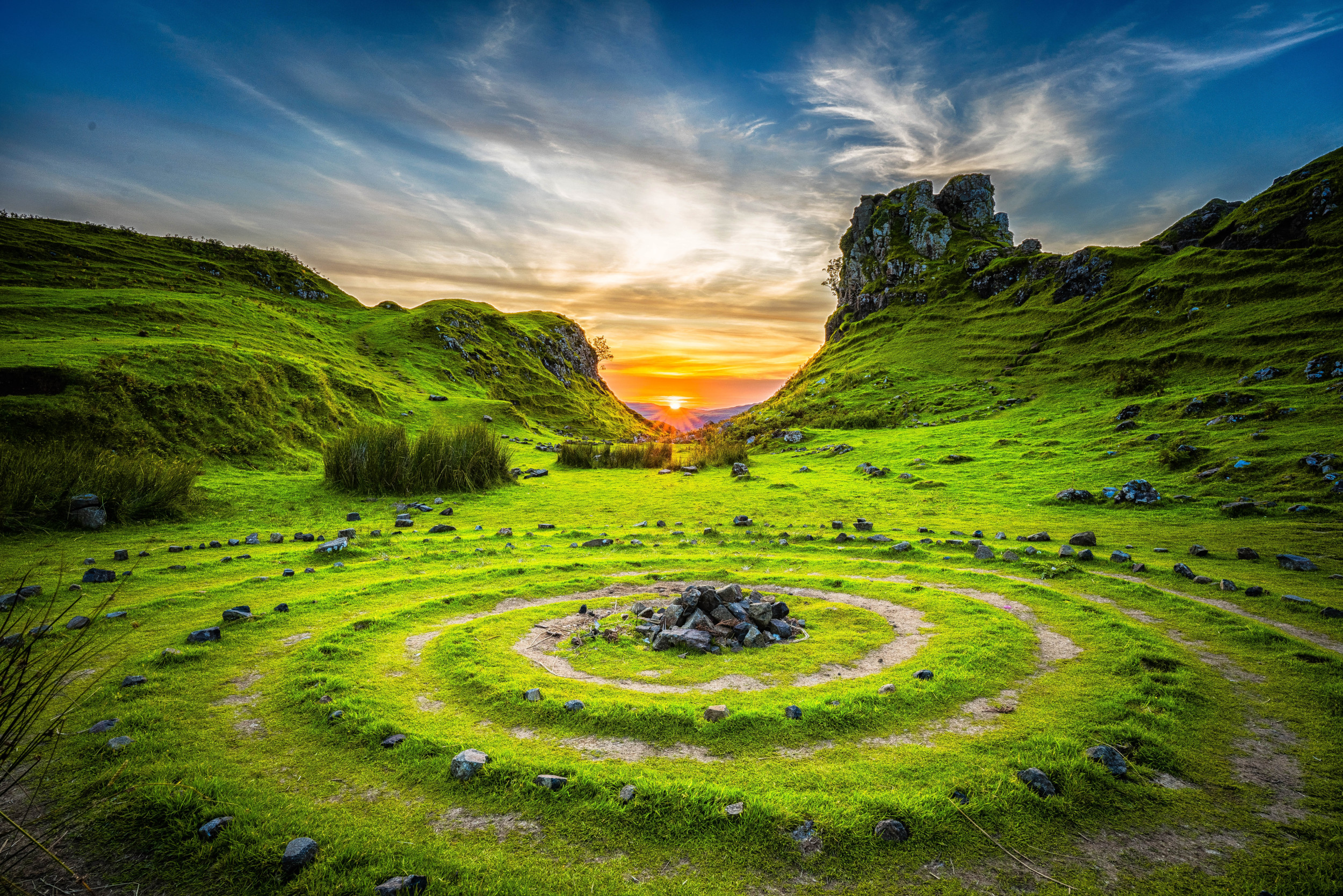 photo of the sunset around a mountainous area